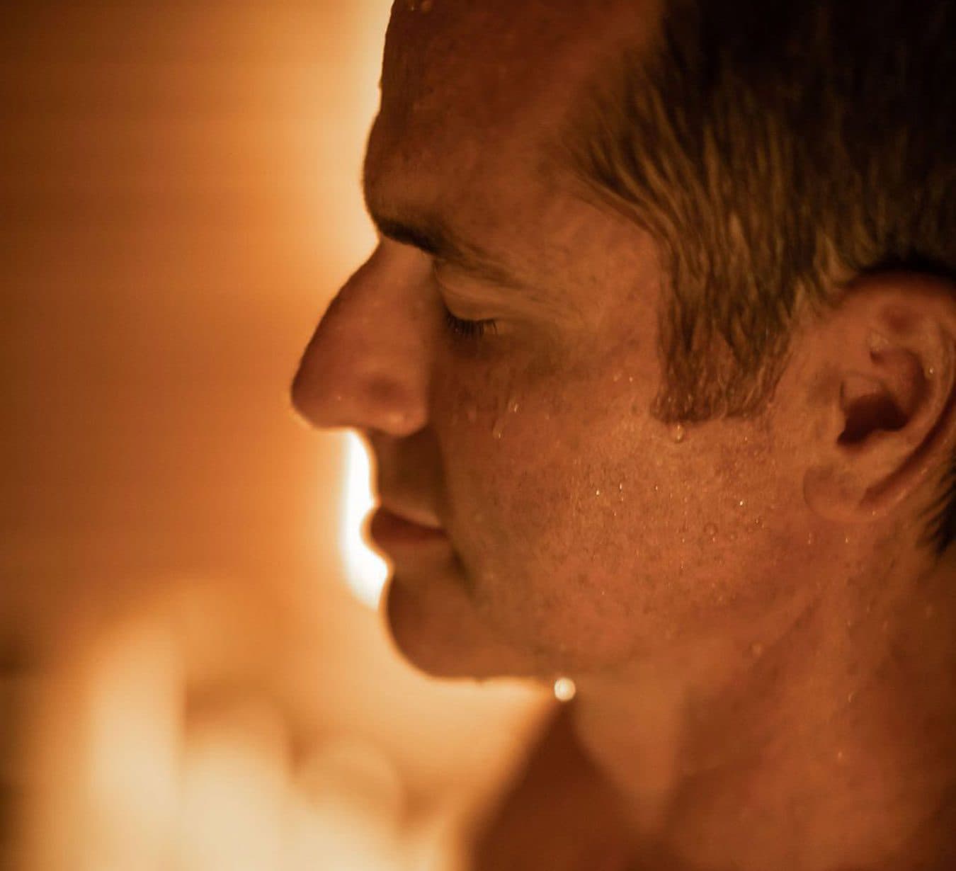 Scandinave Spa ambassador Scott Simons relaxing in the extreme heat of a Finnish sauna.