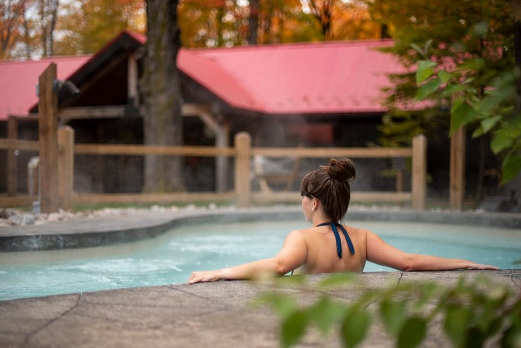 Woman relaxing in outdoor hot Baths