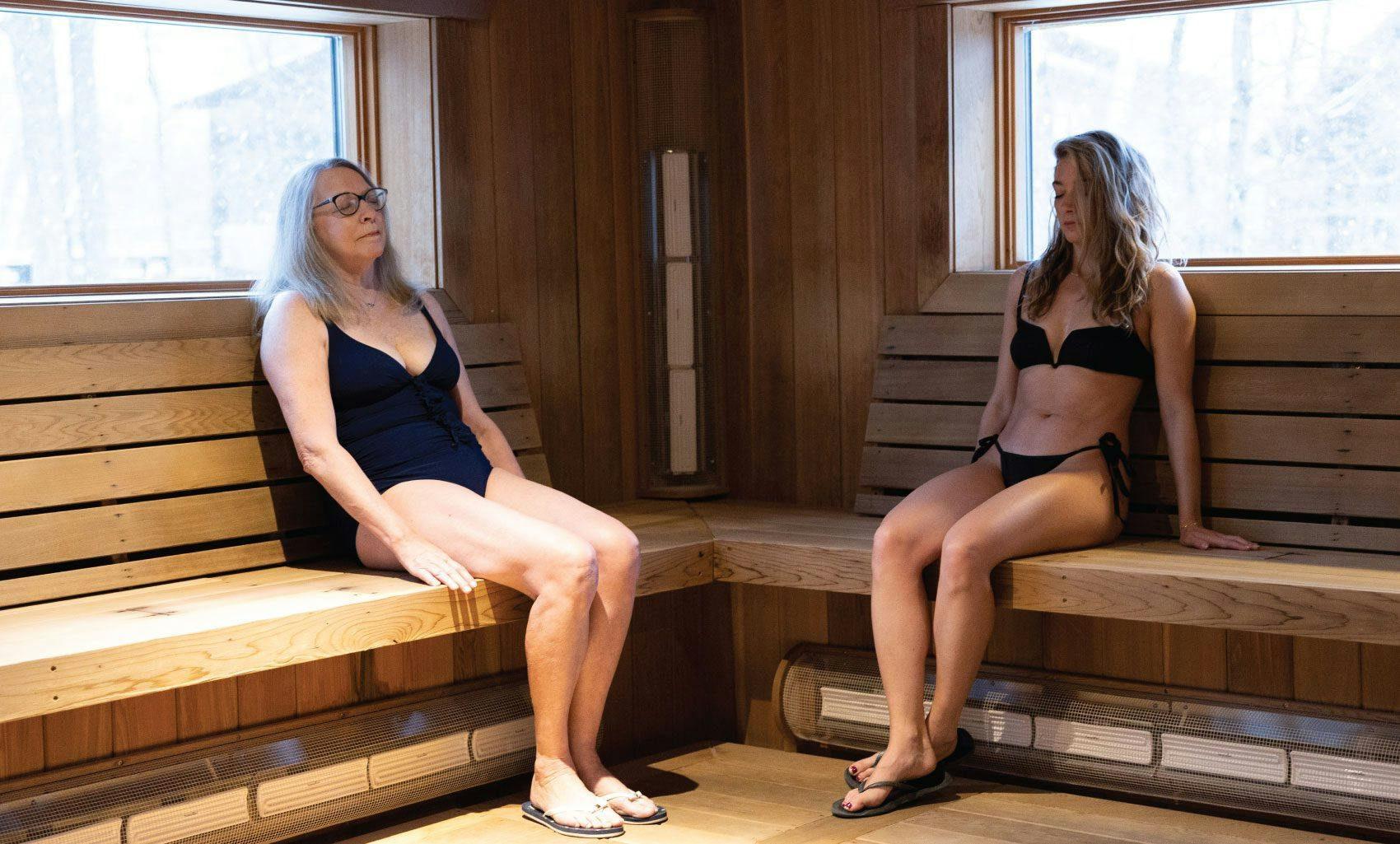 women relaxing in infrared sauna at Scandinave Spa Blue Mountain.