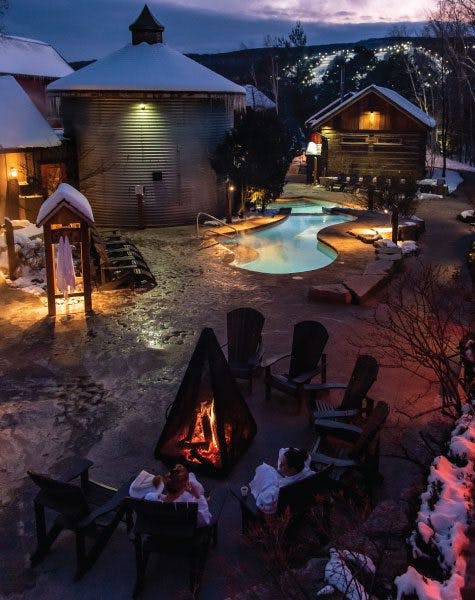 relaxing around the outdoor fire place at Scandinave Spa Blue Mountain.