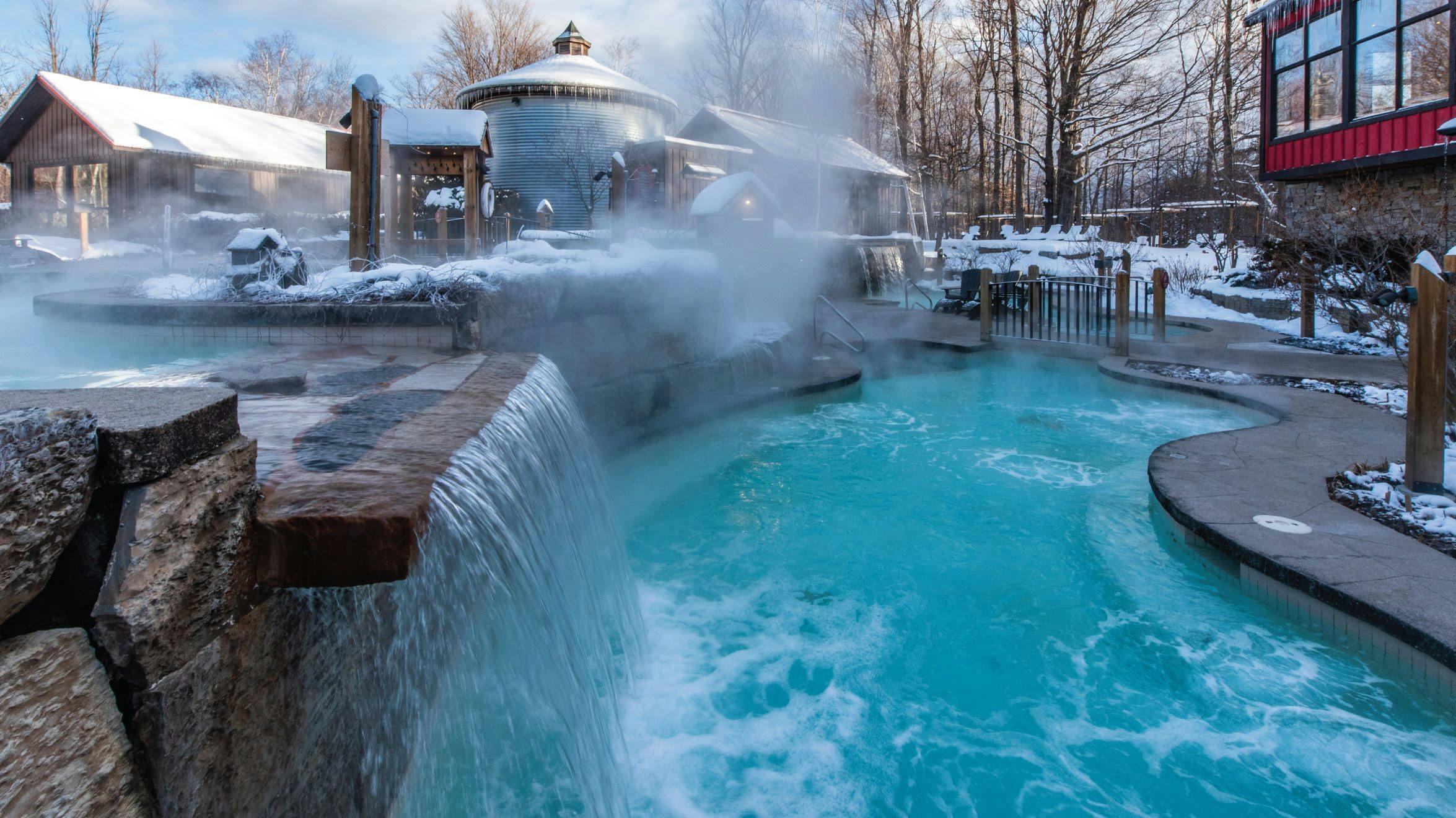 outdoor hot Bath in winter at Scandinave Spa Blue Mountain.