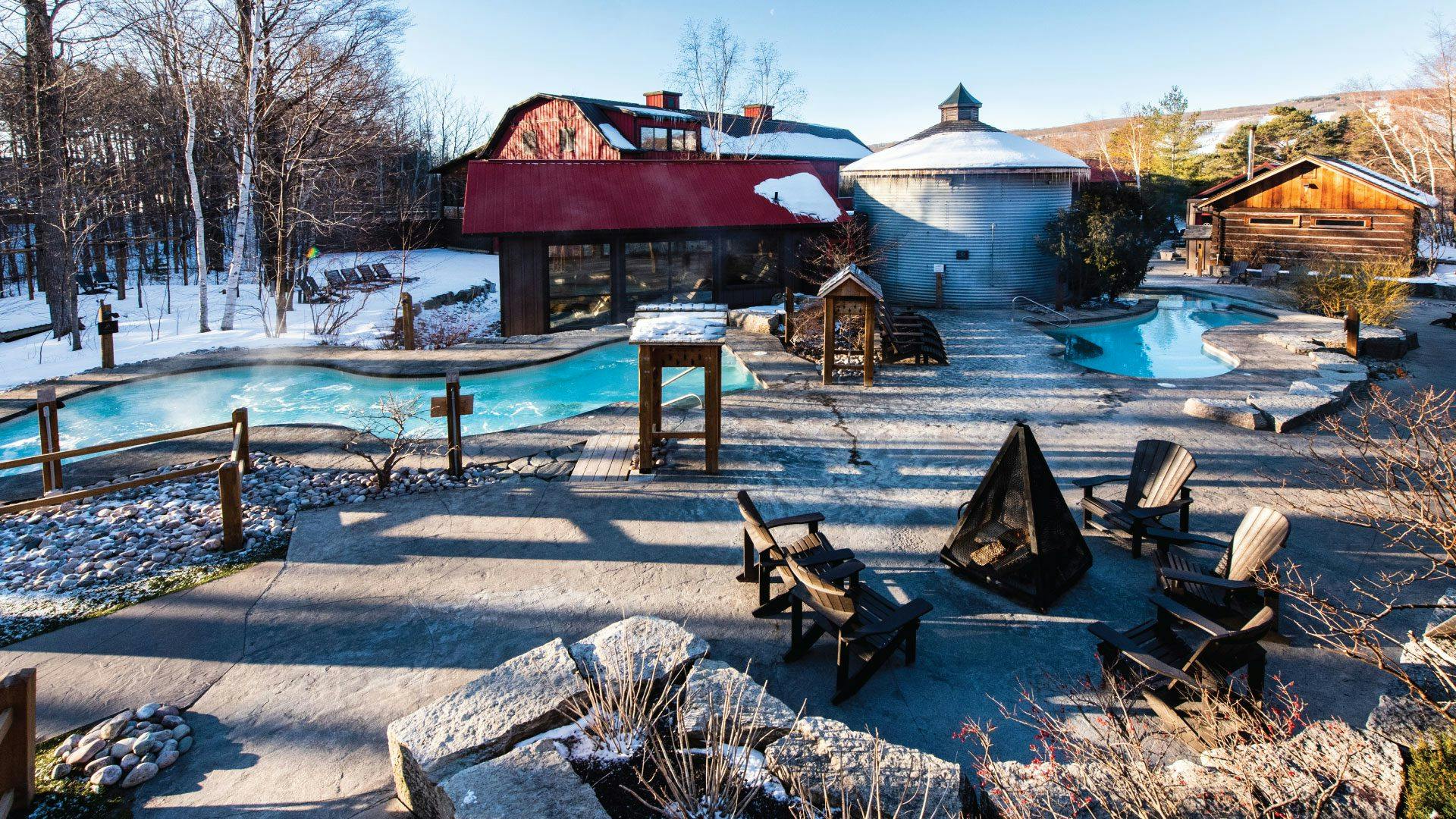 outdoor hot Bath in winter at Scandinave Spa Blue Mountain.