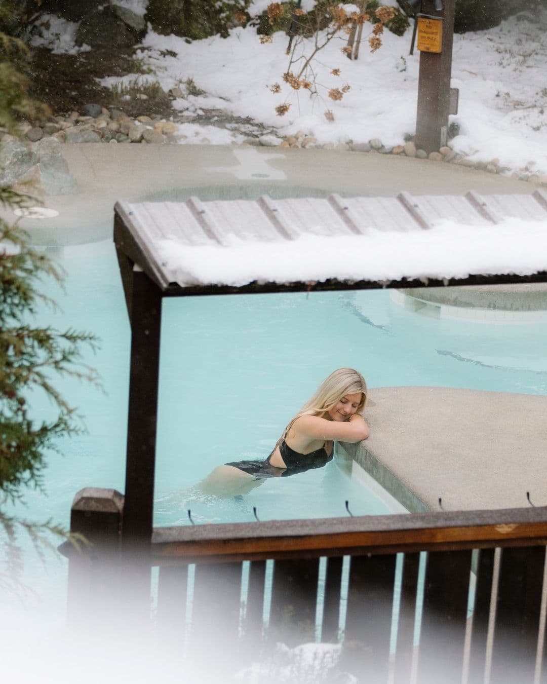 A woman enjoying a thermal pool at the Scandinave Spa Whistler
